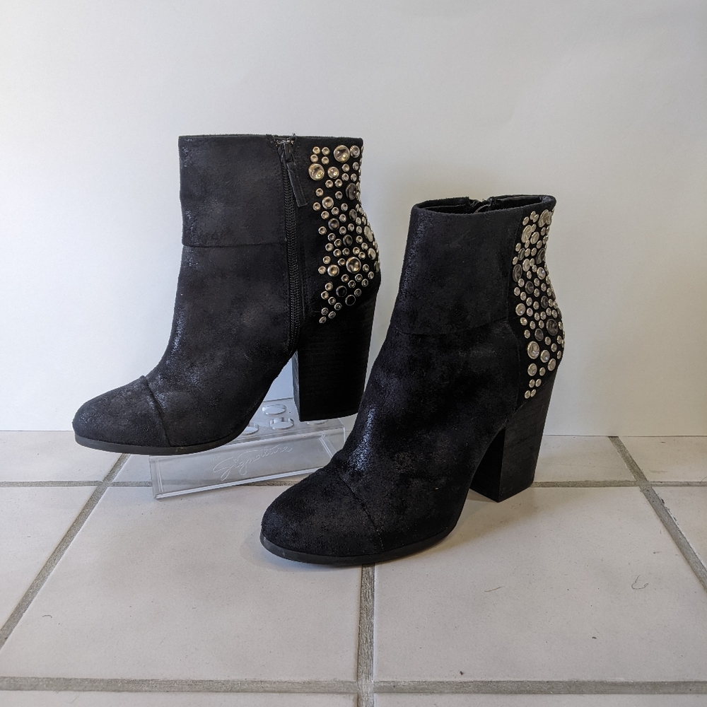 Studded black boots
